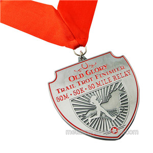 Running race finisher award medal with ribbon